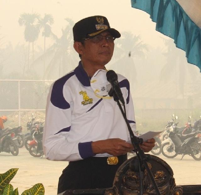Pj Bupati Inhu Hadiri Pelaksanaan Apel Gelar Pasukan Zebra Siak 2015