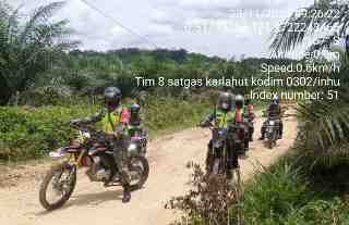 Antisipasi Bahaya Asap Personil Koramil 05/Prp Patroli Karlahut di Desa Pandan Wangi Peranap