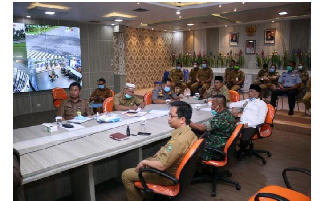 Via Video Conference, Bupati Alfedri Laporkan Penanganan Wabah Covid 19 Kepada Gubernur Riau