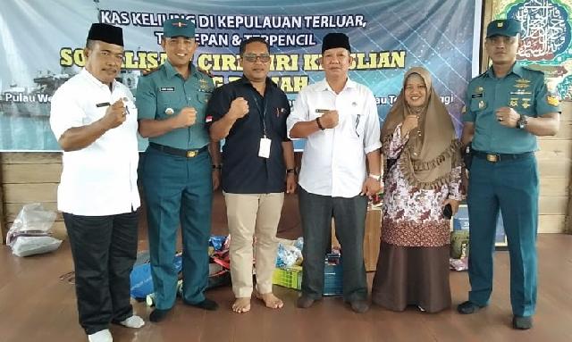 Bank Indonesia Beserta Tim Angkatan Laut Menjalani Sosialisasi Keaslian Uang Rupiah di Meranti