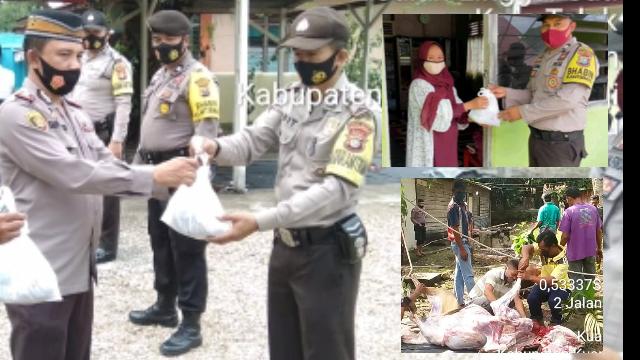 Bhabinkamtibmas Polsek Kuantan Tengah Keliling Kampung Bagikan Daging Kurban di Kuansing